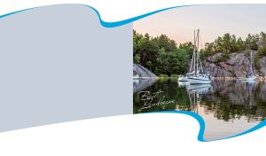 White sailboats at a rocky cliff against gray and white backdrop in a blue frame