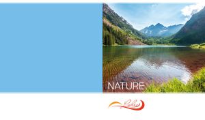 Clear lake between green mountains reflects the blue sky and mountain range