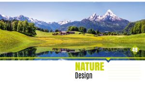 Natural landscape with a green mountain village by a lake on blue sunny day