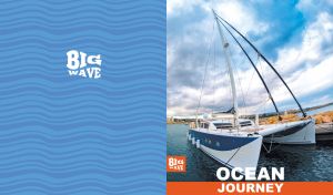 Sailing yacht moored at a marina on a cloudy day on blue