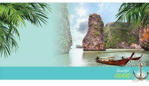 Wooden boats in the light teal water against the green rocks in the ocean