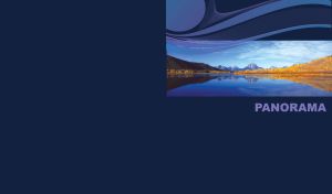 Panorama of a mountain lake mirroring yellow forest, green hills and snowy peaks