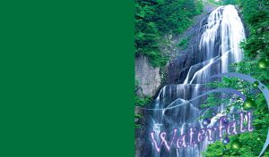 Green trees over the high black rock waterfall and balls decor over the flow