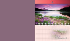 Violet flowers by a summer lake on the cover of a notebook