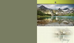 Spring lake at the foot of a rocky mountain range on the cover of a notebook