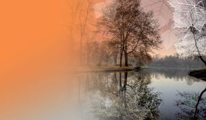 Autumn trees reflected in the silver river under a gray-to-orange gradient sky