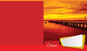 Silhouette of a lonely pier reflected in the ocher calm water on a red backdrop