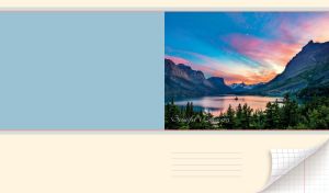 Mountainous landscape with mountain lake surrounded by a forest at dusk