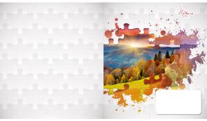 Sunrise in an autumn mountain valley framed by a white puzzle pattern