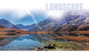 Beautiful scene with snowy mountains reflected in a lake within vignette effect