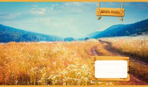 A magical landscape with a dirt road in a yellow meadow against the blue sky