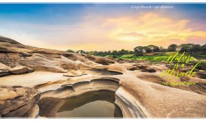 Panoramic scenery with rock holes at Kaeng Sam Phan Bok Grand Canyon