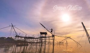 Serene nature scene of Thai fishing village in golden hours