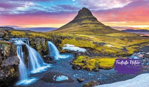 Dramatic sunset over Kirkjufell mountain and waterfalls against a purple sky