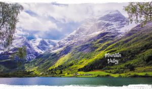 A village nestled in a lush valley by a lake at the foot of a mountain