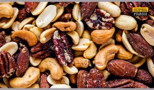Super fresh mixed nuts close-up view in tan and brown shades