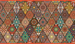 Seamless boho mandala pattern with diamond tiles in ocher hues