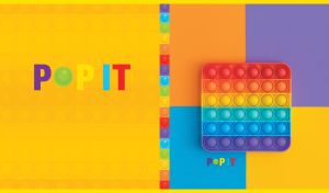 Colorful Pop it toy in the shape of a square on a yellow