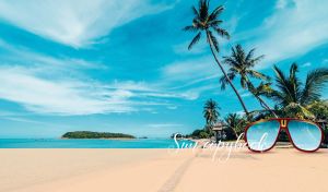 Tropical scene with beach gazebos and palm trees by the blue ocean