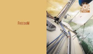 Sailing yacht on the open sea under sunset skies on soft yellow