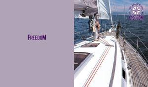 Sailing yacht on the open sea under evening skies on soft violet