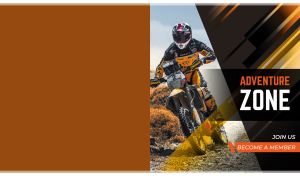 Motocross rider on an off-road on an abstract ocher and black vector backdrop
