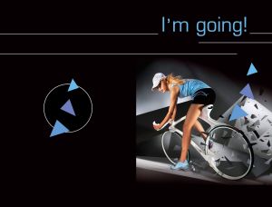 Young female cyclist in a blue T-shirt riding a white futuristic bike on black