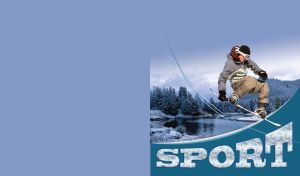 Sportsman on snowboard with winter lake