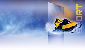 Snowmobiler on a yellow-black sled rides against a purple, blue and white gradient