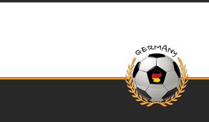 Football with Germany flag framed by a golden laurel wreath on black and white