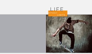 Skater in a check shirt performs a flip trick against a grey background