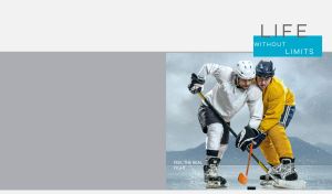 Hockey players fight for puck on ice against a grey background