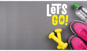 Sneakers, water bottle, and yellow dumbbells on a gray textured backdrop