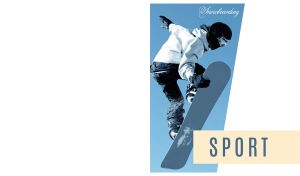 A snowboarder executes an ollie against a blue sky