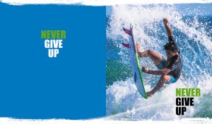 Surfing in action in water splashes on blue and white