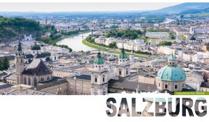 An aerial view of the Old Town In Salzburg, Austria on a white backdrop