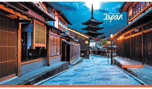 Twilight at traditional Japanese street and pagoda on blue and orange