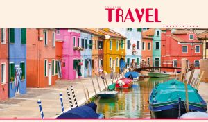 A panoramic view of the colorful houses along the canal in Venice, Italy