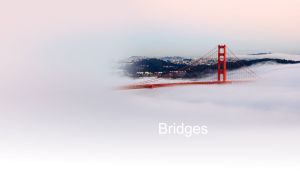 The Golden Gate Bridge in a vignette of the pastel white fog