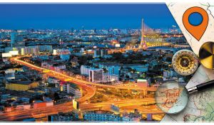 Gorgeous city view with the illuminated Rama VIII Bridge on a blue Bangkok night
