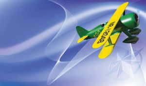Green biplane with yellow wings flies in a gradient blue sky with contrails