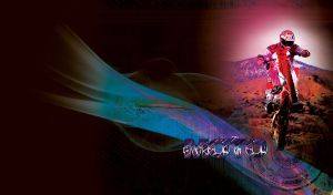 Motorcyclist in a red outfit rides a moto into the blue graphic flames