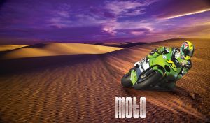 Motorbike racer at a motocross race event in sand dunes during blue hour