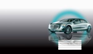 Gray green luxury business class sedan in a teal glowing circle on grey gradient