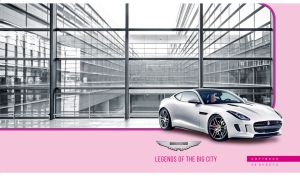 White luxury sports car in front of a large window glass on a pink background
