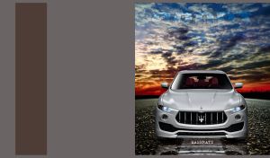 White SUV car on a road against a red and blue sunset