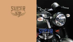 Close-up of a motorcycle headlight and handlebar on black and orange