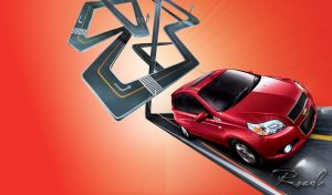 Winding road with a red hedge-back car