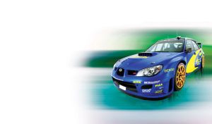 Side shot of a blue sedan with a sand color wheel rims on teal and green