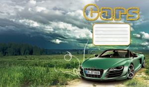 A green sport convertible car on a grass field